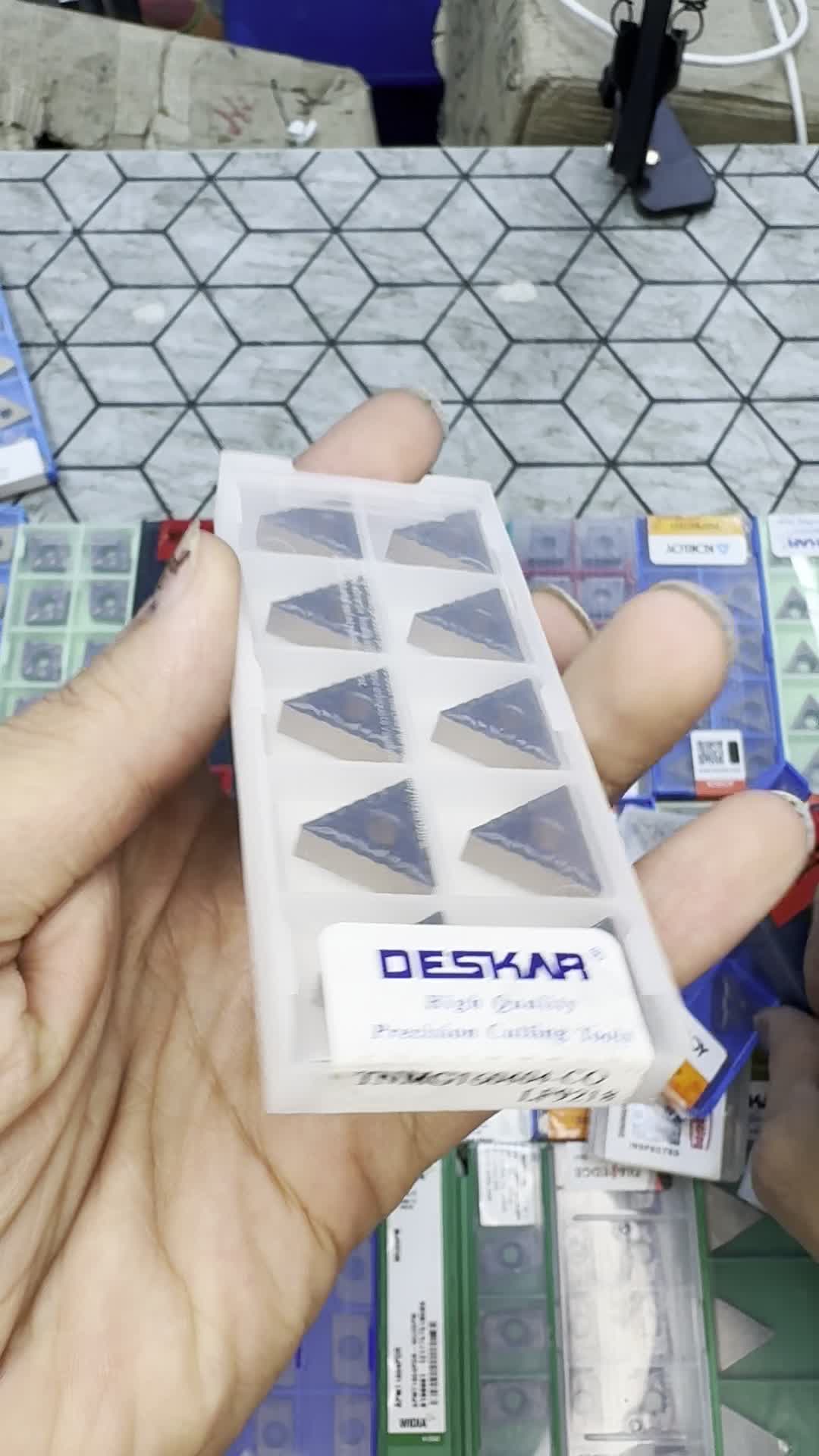 Deskar TNMG insert packaging shown in the Midland Tools video